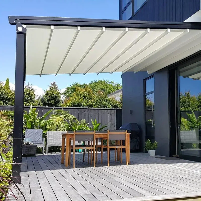 Large retractable aluminum pergola covering a public-facing outdoor commercial deck