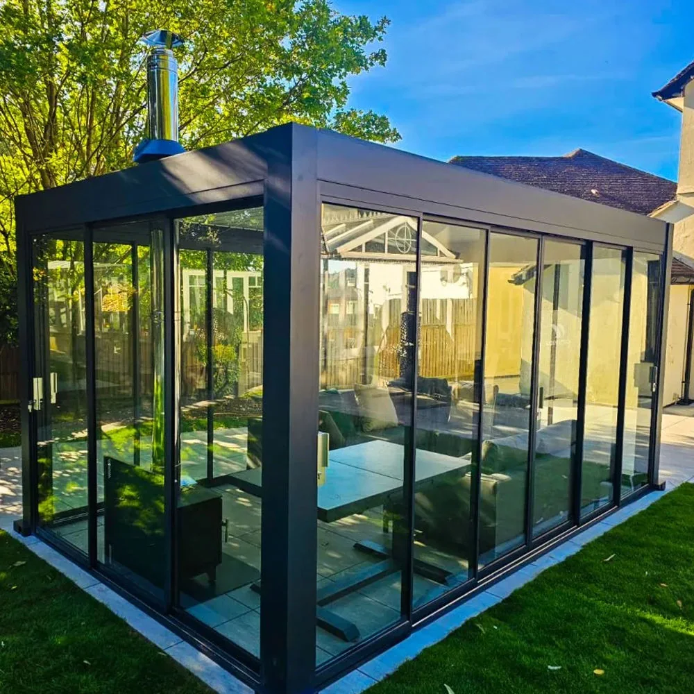 Glass enclosed aluminum pergola used as a residential garden room