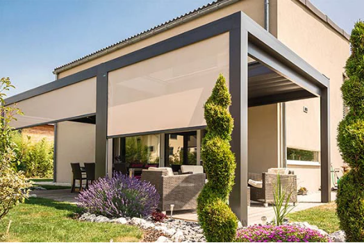 Aluminum pergola with retractable side roller blinds