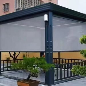 Freestanding aluminum pergola with retractable windproof roller screens installed in a residential courtyard