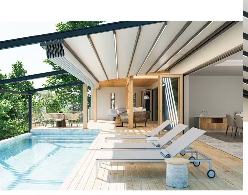 Motorized retractable fabric pergola awning with an aluminum frame installed over a residential poolside patio