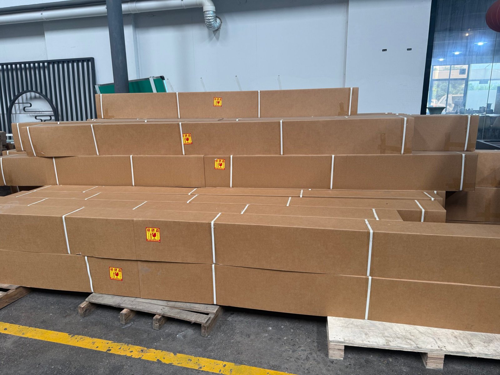 Packaged aluminum pergola components prepared in the factory