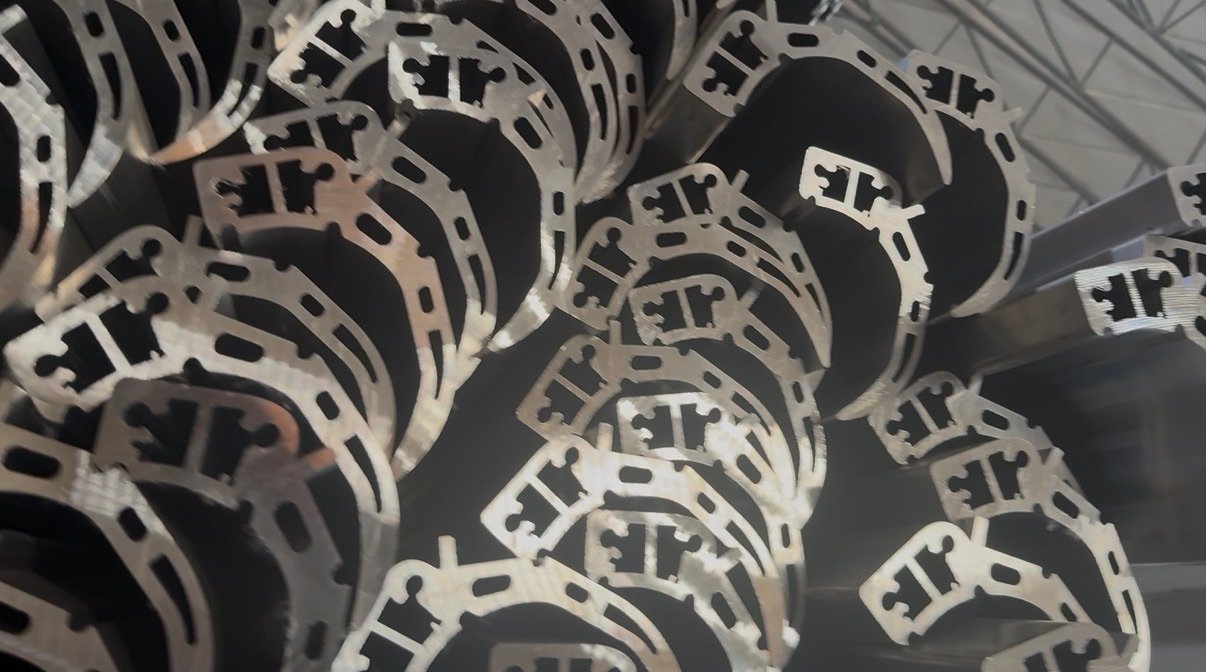 Close-up of aluminum louver roof profile during production review